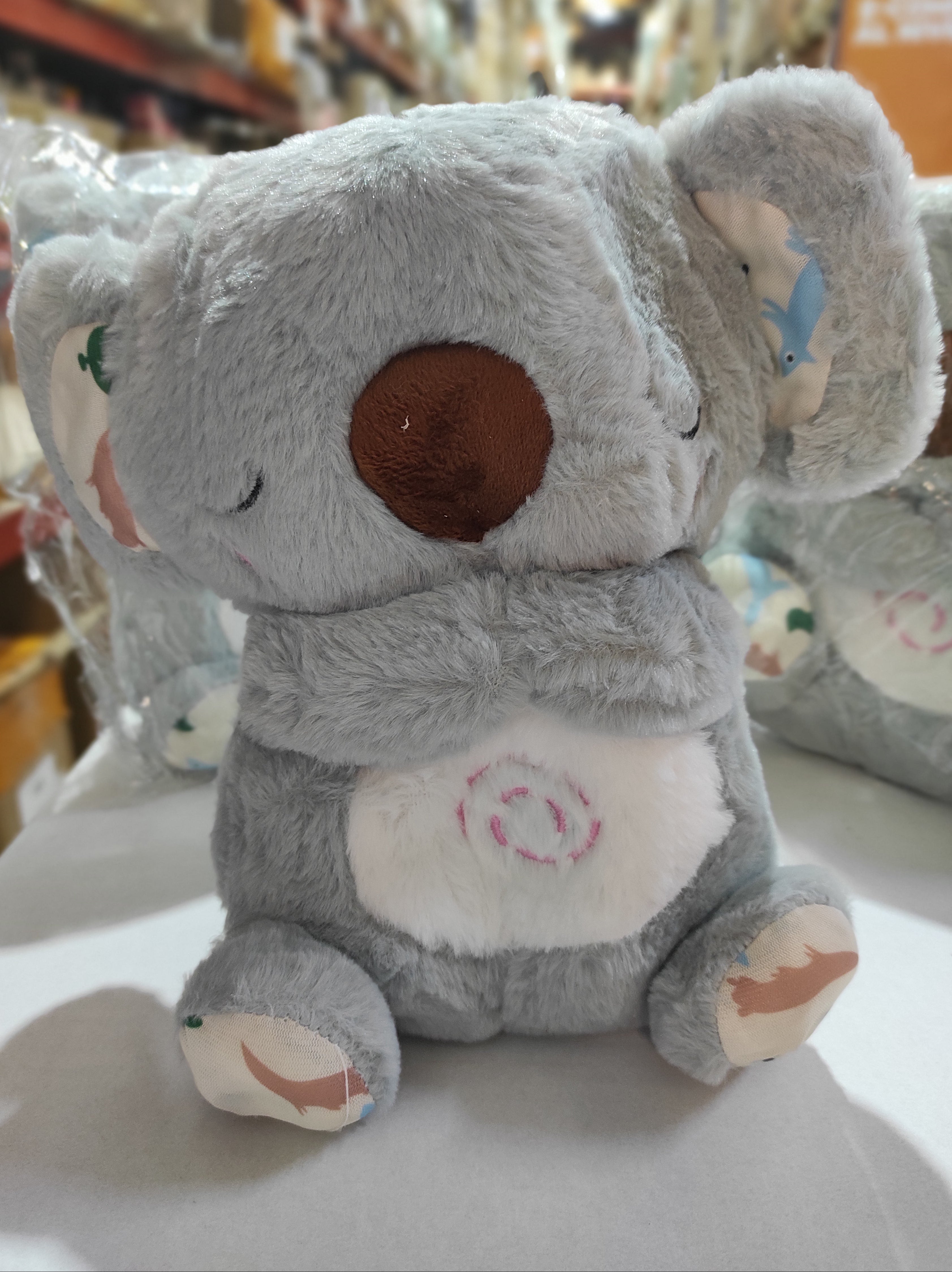 Peluche relajante para bebé que simula respiración ( koala gris )